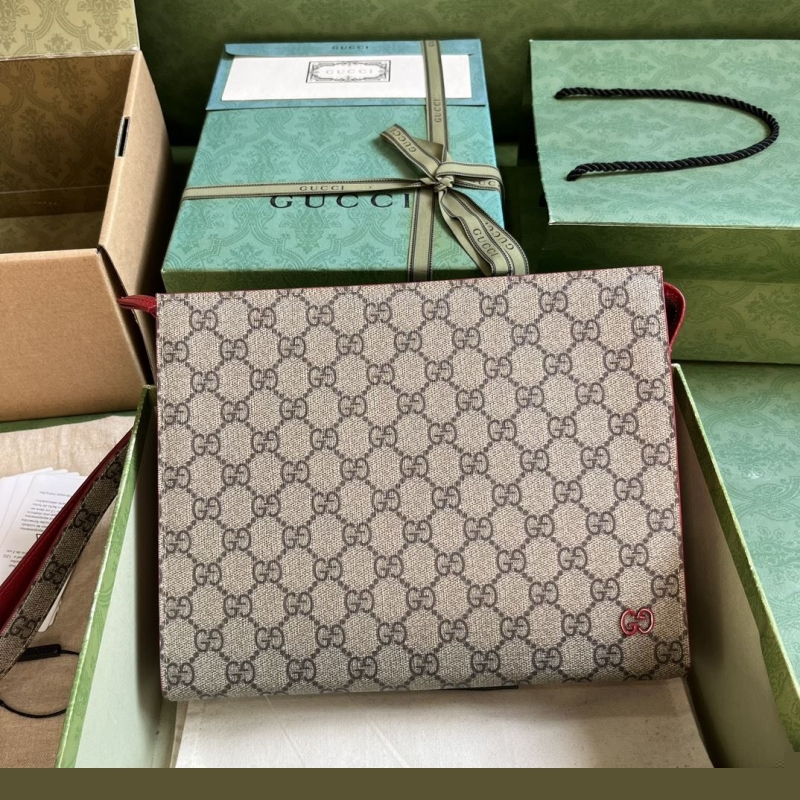 G*u*i clutch bags